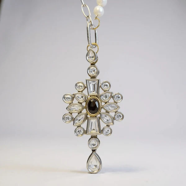 Orna Curio Vintage Bespoke Pearl and Diwali Flower Necklace - LUXAMORE -necklace-One of a Kind – Hand-crafted Necklace This elegant necklace features a vintage diamante crystal element, complemented by a sterling silver chain and fittings, with a vintage gold-plated garnet Indian floral centrepiece. This one of one necklace was handcrafted in Perth, WA. Measurements: 61cm Adjustable Materials: Sterling Silver 925 Chain and Hardware, Freshwater Pearls, Vintage Indian garnet and crystal Centrepiece.