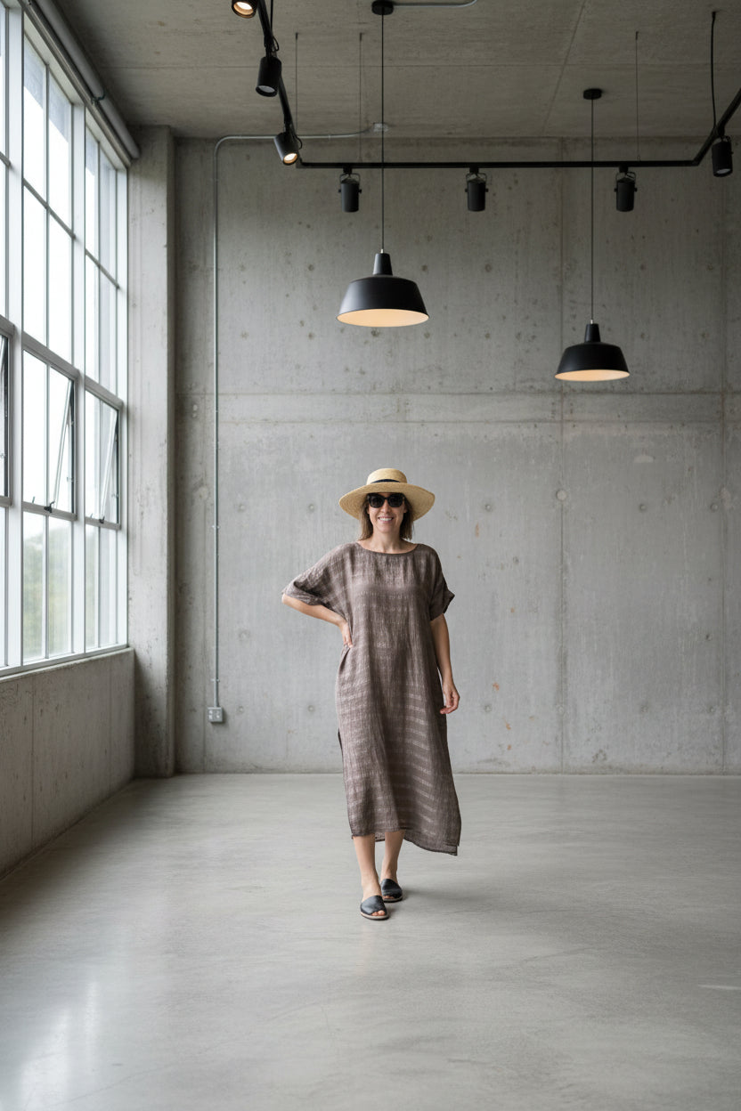 Woman in a long dress and hat 
