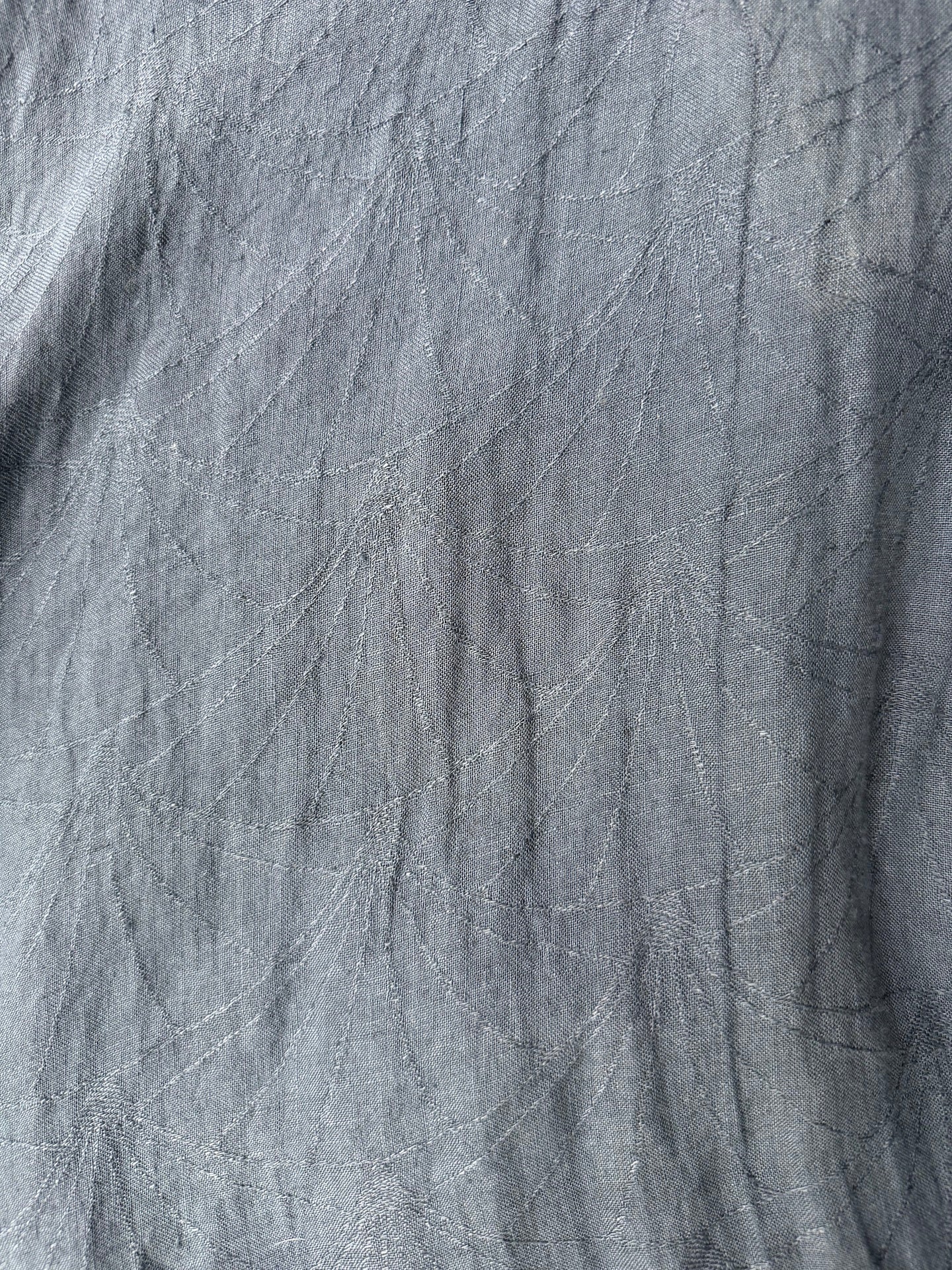 Close-up of gray fabric with visible texture