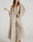 Estilo Emporio Fortune Top - LUXAMORE -Tops-Editors Notes A beautifully cut loose weave linen top, made in Positano Italy from Italian linen. This top fits true to size and is a must for any wardrobe. in a textured open weave, the Fortune Top has a boho luxe feel with an understated sleeve creating a contemporary fluid shape. Handmade in Italy the traditional way, Available now from LUXAMORE Colours available:Natural Italian linen Size is OSFA for small or extra small Style L4007