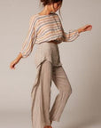 Estilo Emporio Poppy Top - Natural - LUXAMORE -Top-Editors notes: The Poppy Top - An Estilo best seller! Sheared elastic around waist with detail on sleeve, a classic boat neck design. Match with your favourite Estilo Flared pant for that European summer holiday. Handmade in Italy from 100% Italian Linen. Relaxed and stylish. An Italian summer classic that looks ..oh so fabulous! Model wears small Fabric - 100% Italian Linen, handcrafted in Italy