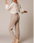 Estilo Emporio Poppy Top - Natural - LUXAMORE -Top-Editors notes: The Poppy Top - An Estilo best seller! Sheared elastic around waist with detail on sleeve, a classic boat neck design. Match with your favourite Estilo Flared pant for that European summer holiday. Handmade in Italy from 100% Italian Linen. Relaxed and stylish. An Italian summer classic that looks ..oh so fabulous! Model wears small Fabric - 100% Italian Linen, handcrafted in Italy